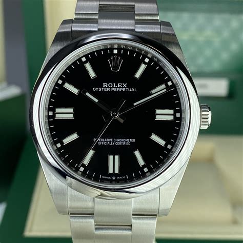 rolex oyster perpetual black price.